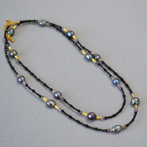 Baroque black pearl and spinel long layered necklace with gold accents for winter