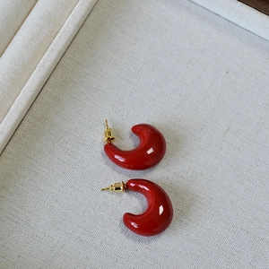 Chic Angola red teardrop stud earrings in 925 silver with a polished finish