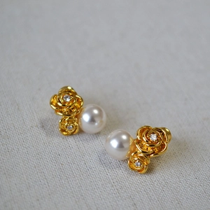 Elegant gold rose stud earrings with pearls and crystals for women in minimalist style