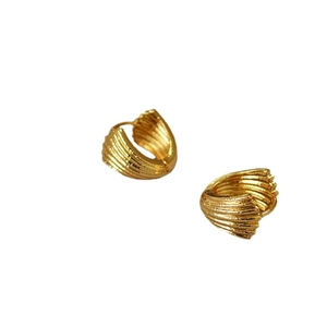 French retro shell textured golden brass chunky hoop earrings in a minimalist style