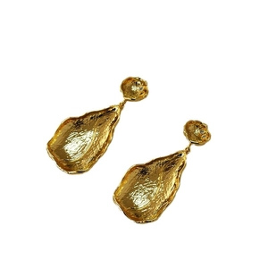 Gold-plated brass leaf earrings with irregular hammer texture and drop-shaped design