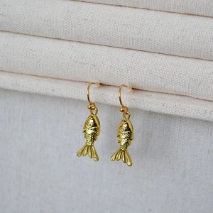 Gold-plated brass fish earrings with sparkling cubic zirconia and detailed scale textures
