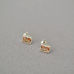 S925 silver stud earrings featuring rectangular amber cubic zirconia in a minimalist style