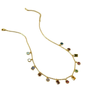 French vintage brass gold plated necklace with colorful zircon gemstones on white background