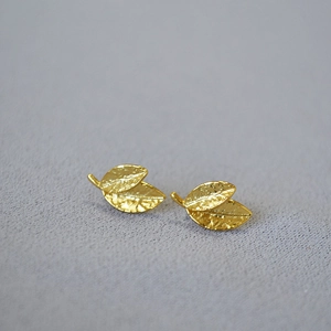 Vintage gold leaf stud earrings with natural vein textures and 925 silver needle posts
