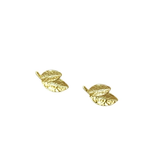Minimalist vintage brass leaf studs with gold plating and detailed vein textures