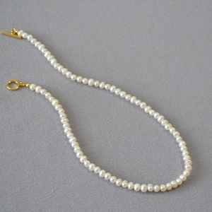French style baroque freshwater pearl necklace with an elegant golden OT toggle clasp