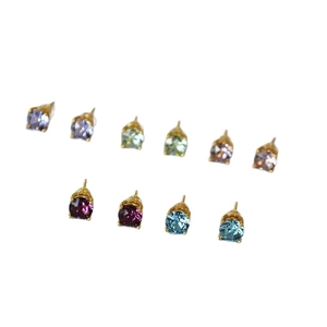 Minimalist 925 silver stud earrings set with colorful sparkling crystals and gold claw settings