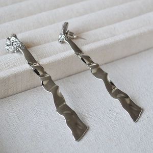 Silver wavy drop earrings with liquid metal texture and hammered finish for women