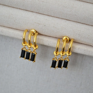 Elegant gold earrings with triple rings and black rectangular zircon tassels for women