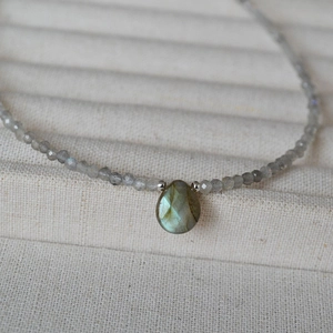 Vintage gray beaded necklace with a teardrop labradorite pendant and silver metal spacers