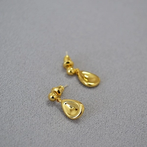 Minimalist gold teardrop earrings for women with a polished metallic mirror finish