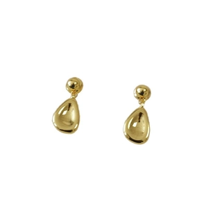 Minimalist gold plated teardrop earrings with a smooth polished finish on white background