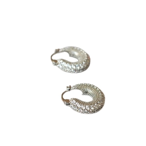 Sparkling silver hoop earrings with pavé set cubic zirconia for a luxurious fashion look