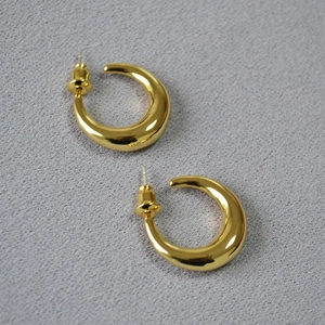 Minimalist chunky golden crescent hoop earrings with high polish finish for women