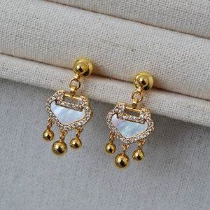 Elegant Chinese Ruyi lock earrings with white mother-of-pearl and gold bead charms