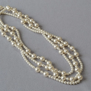 Elegant multi-layer faux pearl long sweater chain necklace with high-gloss finish