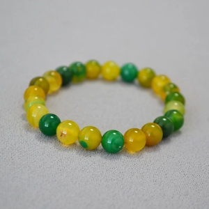 Minimalist green and yellow agate beaded stretch bracelet for women featuring polished stones