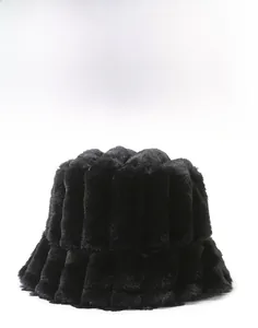 Detail of black striped faux fur bucket hat showing thick texture and sturdy brim