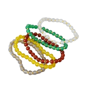 Translucent agate beaded bracelets with gold spacers in five colorful stackable styles