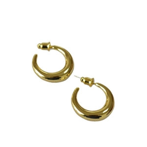Polished gold-plated brass crescent stud earrings with a minimalist geometric design