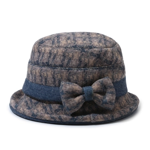 Women's vintage wool bucket hat with star pattern texture and denim bow accent
