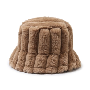 Detailed view of the thick striped texture on a warm coffee brown faux fur bucket hat