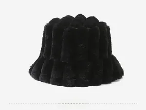 Close-up of black fuzzy fisherman hat with vertical stripe texture and plush fabric