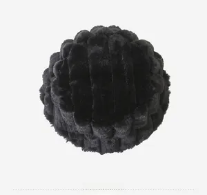 Top view showing the thick plush texture and vertical stripe pattern of the black bucket hat