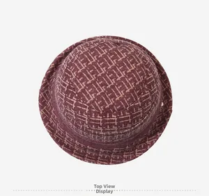 Top view of a winter bucket hat for women with burgundy geometric wool patterns