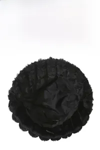 Detail view of plush black faux fur winter bucket hat with warm fabric inner lining
