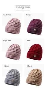 Detail view of winter knitted hats for women in six colors with pearl flower decor