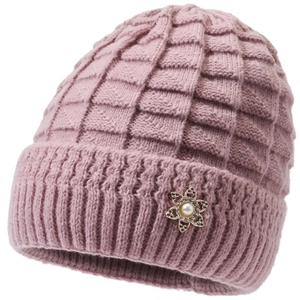 Detail of winter knit hat featuring a metal flower accent with pearl and rhinestone