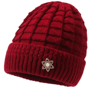 Thick burgundy knit winter hat for elderly women with decorative pearl flower accent