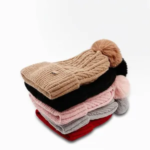 Winter chunky cable knit beanie hat with faux fur pom pom and warm fleece lining