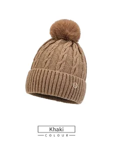 Khaki cable knit beanie for women with faux fur pom pom and crystal H metal logo