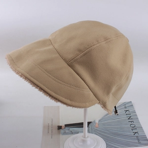 Detail of khaki bucket hat with plush faux shearling lining and adjustable drawstring