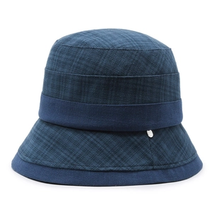 Navy blue knitted cloche hat for middle-aged women with a decorative metal charm