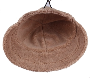 Detail view of winter faux lamb wool bucket hat with adjustable inner drawstring
