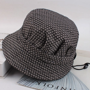 Women's gray textured fisherman bucket hat with shimmering glitter and adjustable drawstring