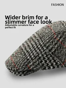 Detail of grey plaid beret cap with red stripes and adjustable curved brim feature