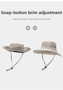 Detail of outdoor sun hat featuring side snaps for brim adjustment and breathable mesh panels