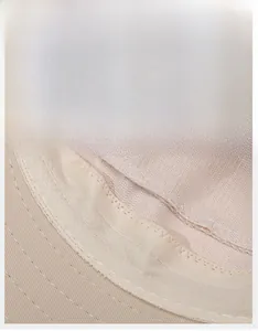 Detail of wide breathable sweatband inside beige sun hat for moisture wicking