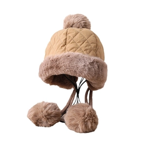 Winter thermal trapper hat with khaki quilting, faux fur earflaps and plush pom-poms