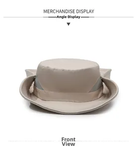 Front view of beige sun hat with wide brim and gray breathable mesh panels