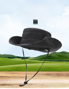 Detail of a black sun protection bucket hat with wide brim and adjustable windproof strap