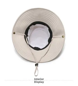 Detail view of beige sun hat with breathable mesh lining and adjustable windproof cord