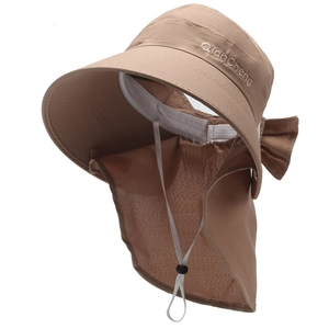 Detail of khaki sun hat with wide brim, neck protective flap and decorative bow knot