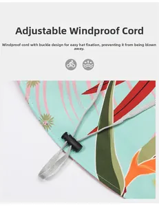Detail of adjustable windproof rope with toggle on floral print wide brim sun hat