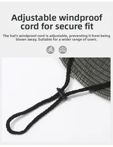 Detail of adjustable windproof drawstring with plastic toggle on grey outdoor sun hat